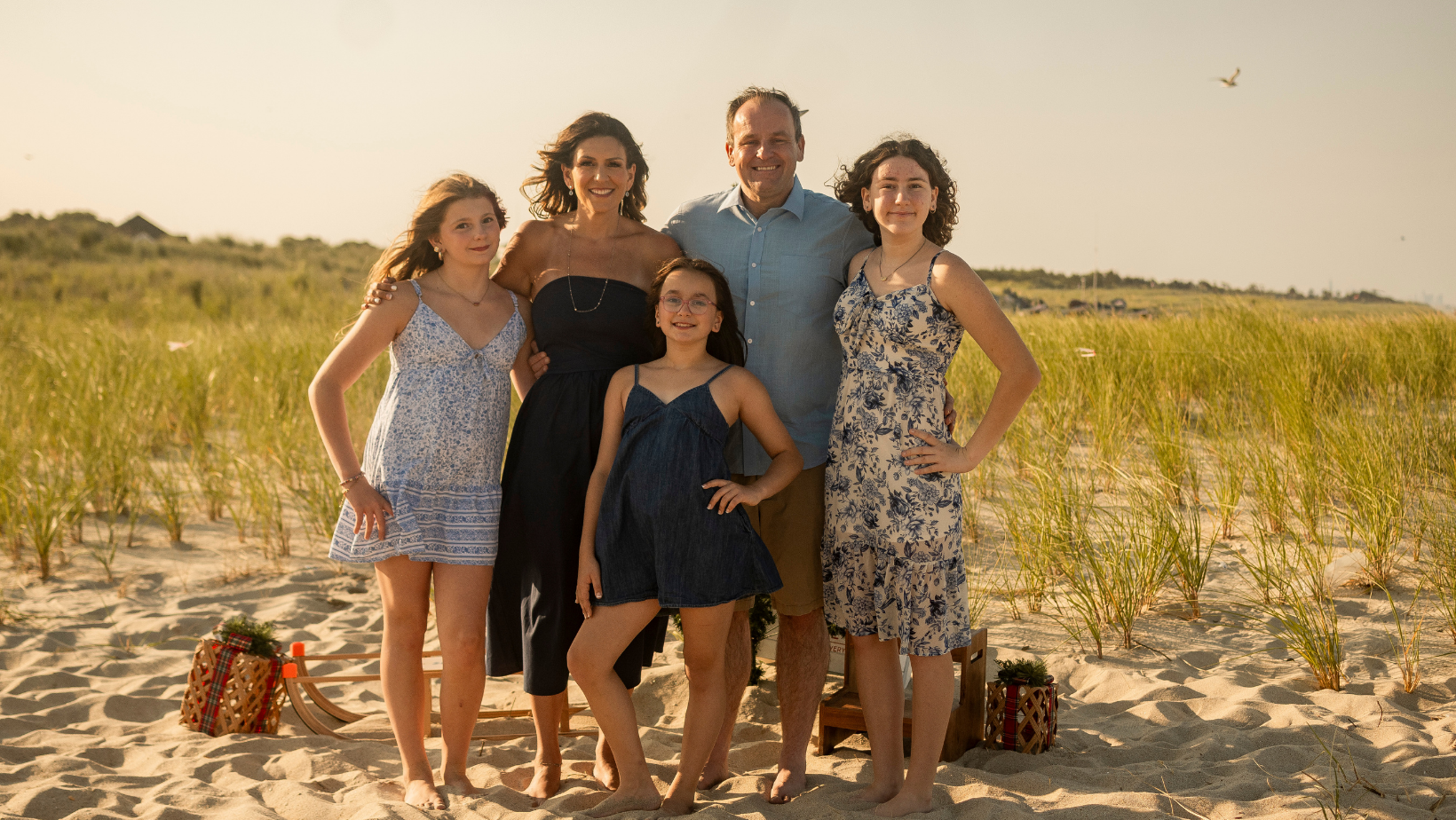 Family on the beach exploring New Jersey