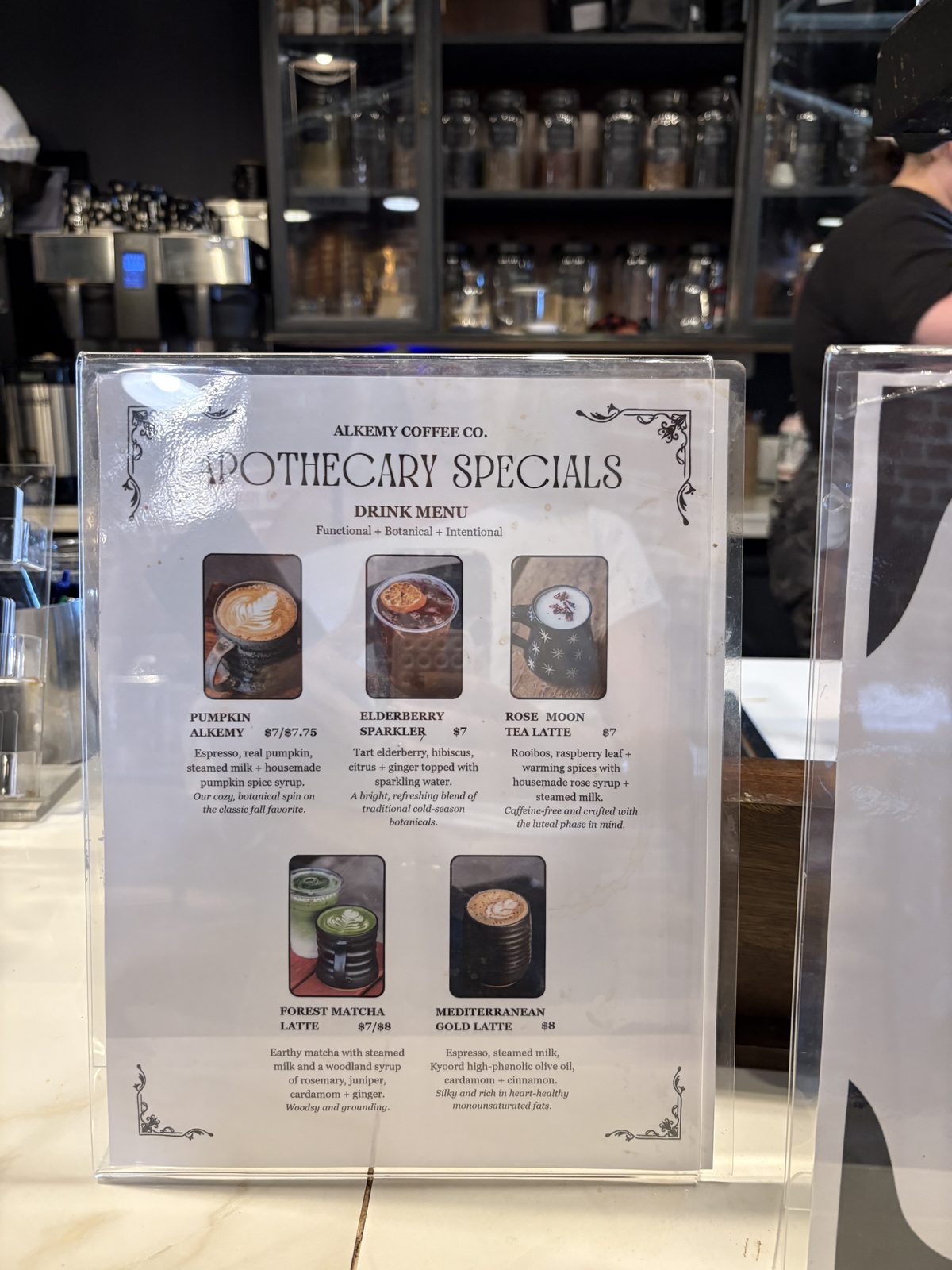 Alkemy Coffee Co., Flemington - the Apothecary Specials drink menu on the counter
