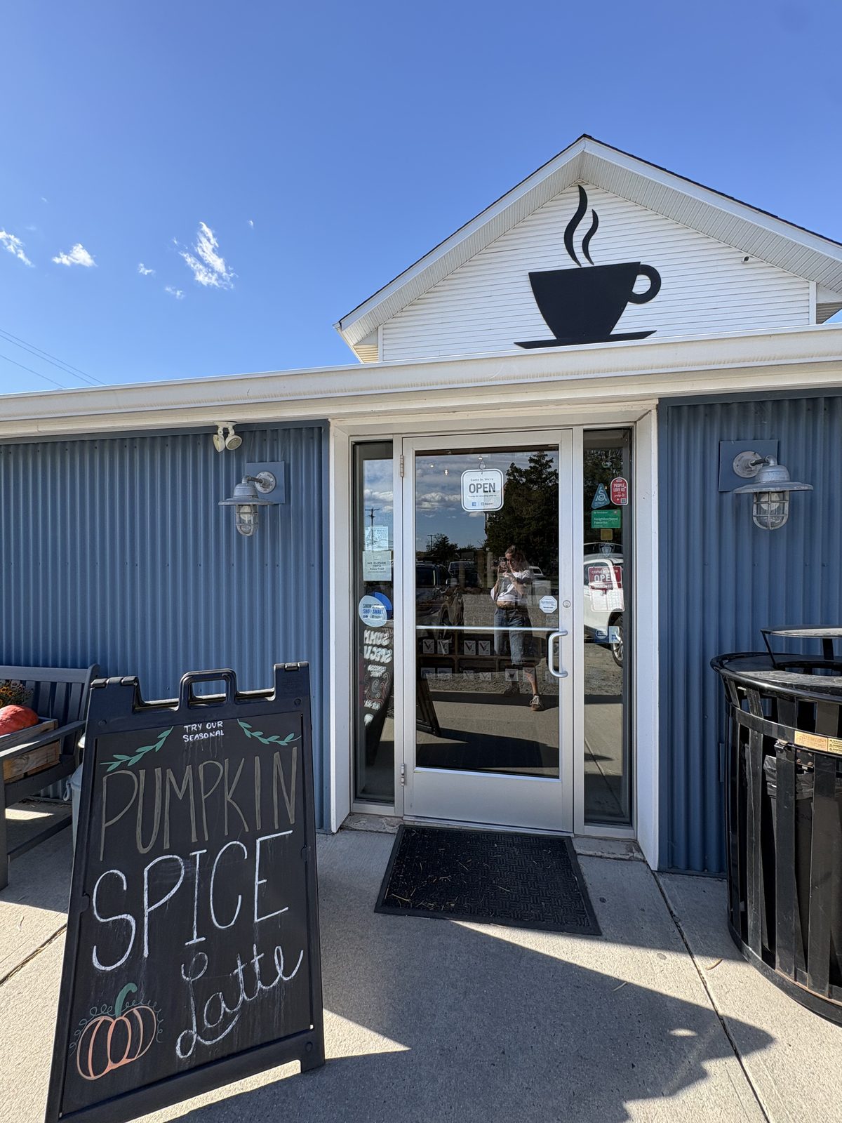 Black River Roasters, Whitehouse Station - the blue metal building with a coffee cup on the gable and a Pumpkin Spice Latte sign out front
