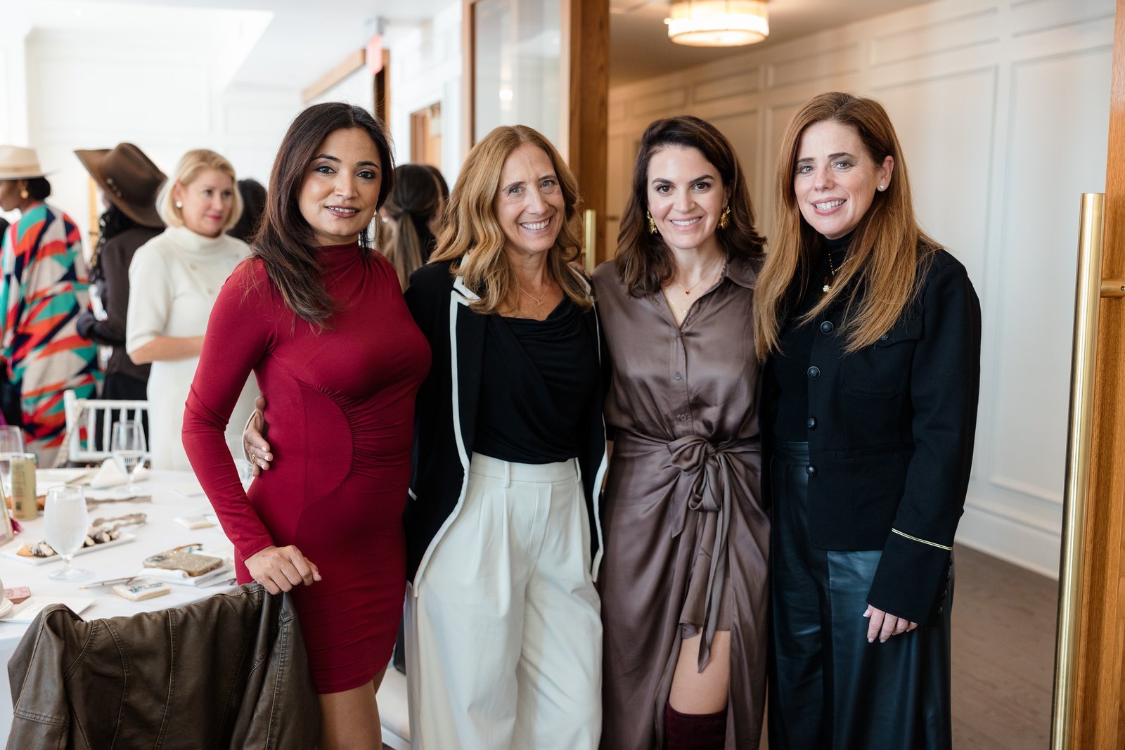 Boardrooms & Brunch, Pendry Natirar, Oct 9 2026 - four guests posing together with set luncheon tables behind them