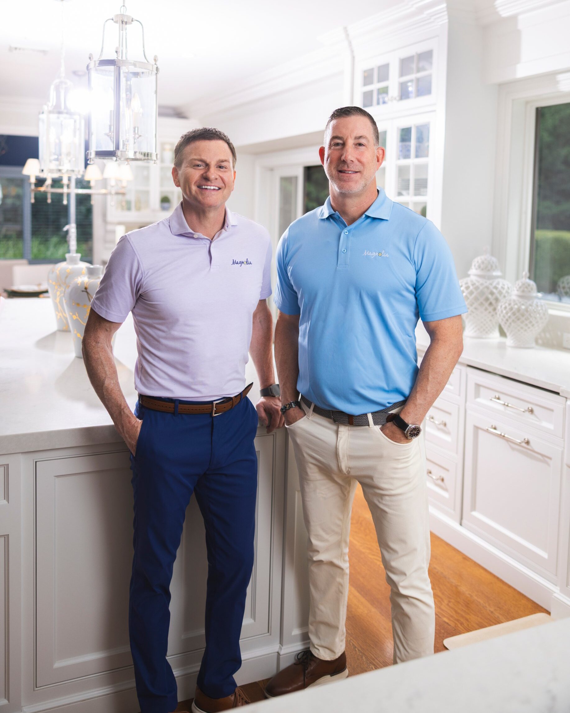 Vic Fiore and Chris Fontana, owners of Magnolia Home Remodeling Group, standing in a finished kitchen