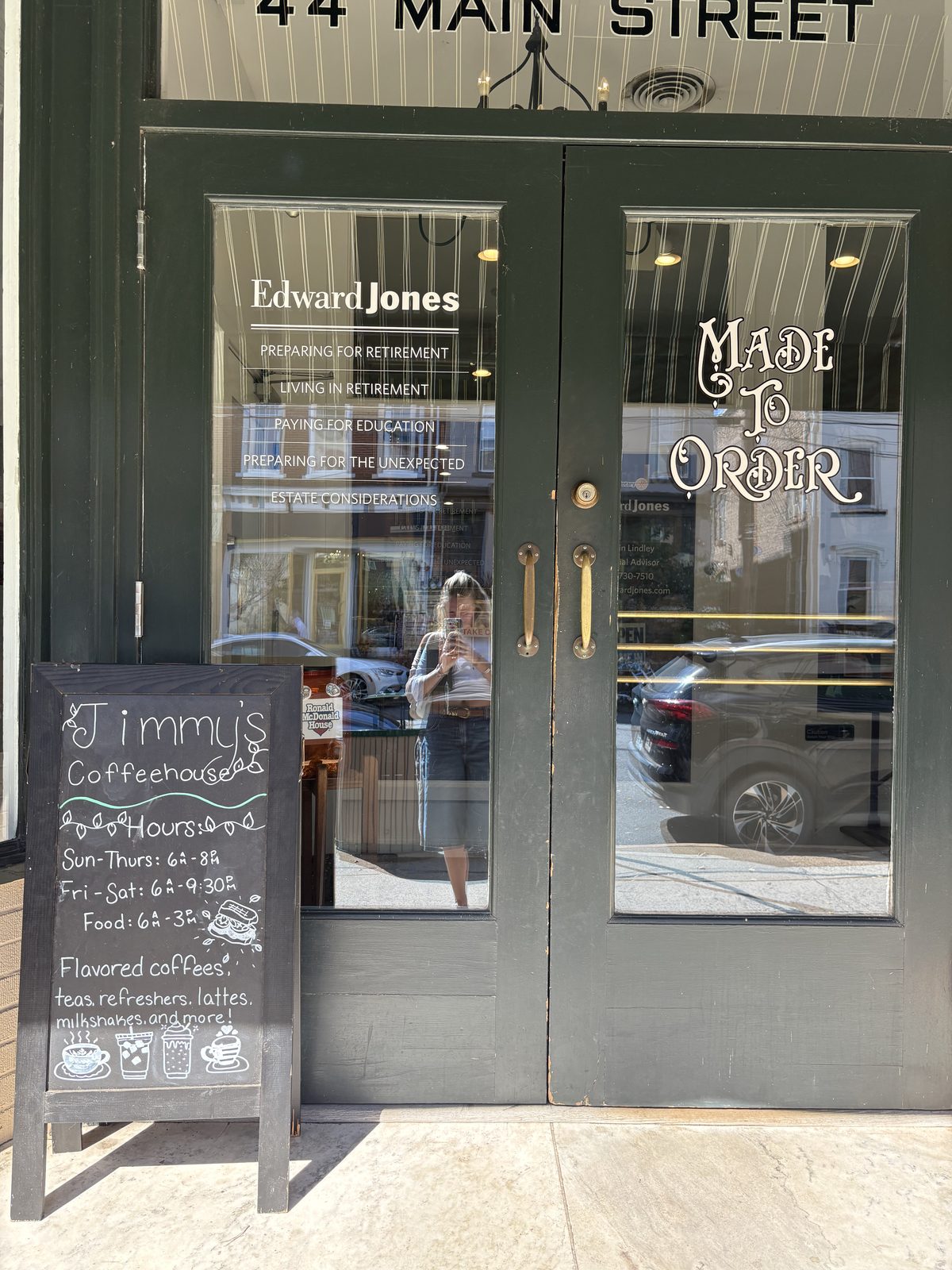 Jimmy's Coffeehouse, Clinton - the entrance at 44 Main Street with the hours chalkboard out front