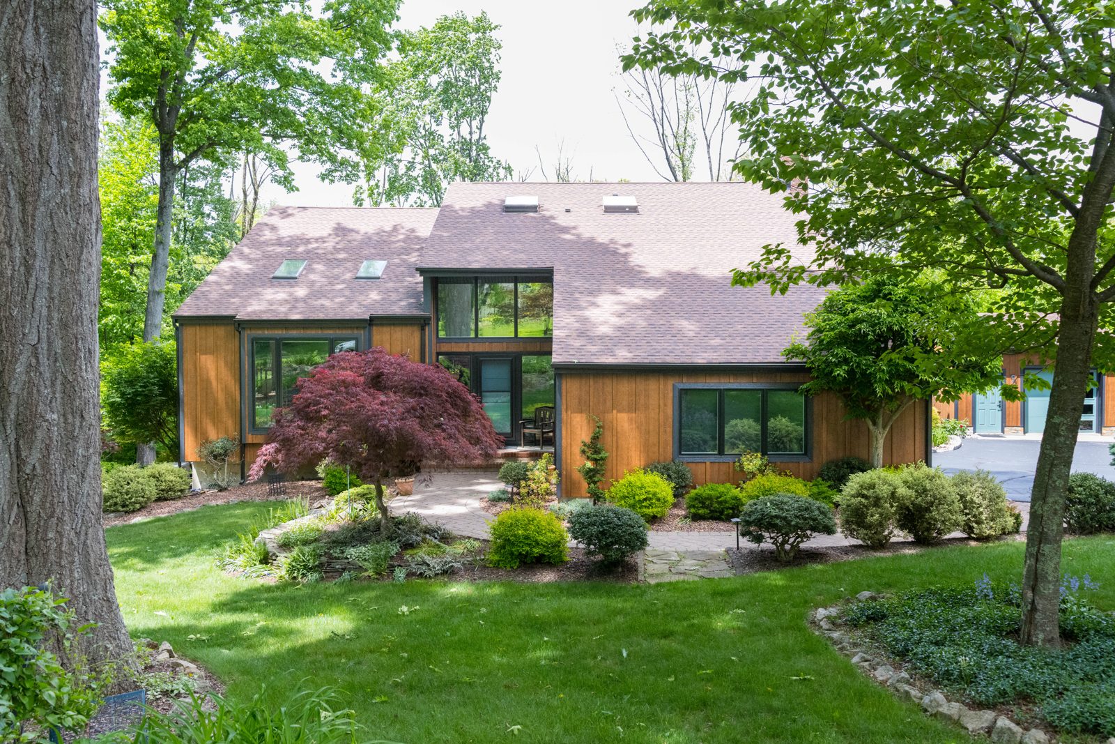 Magnolia Home Remodeling Group, Flanders NJ: front of a home with Diamond Kote board and batten vertical siding