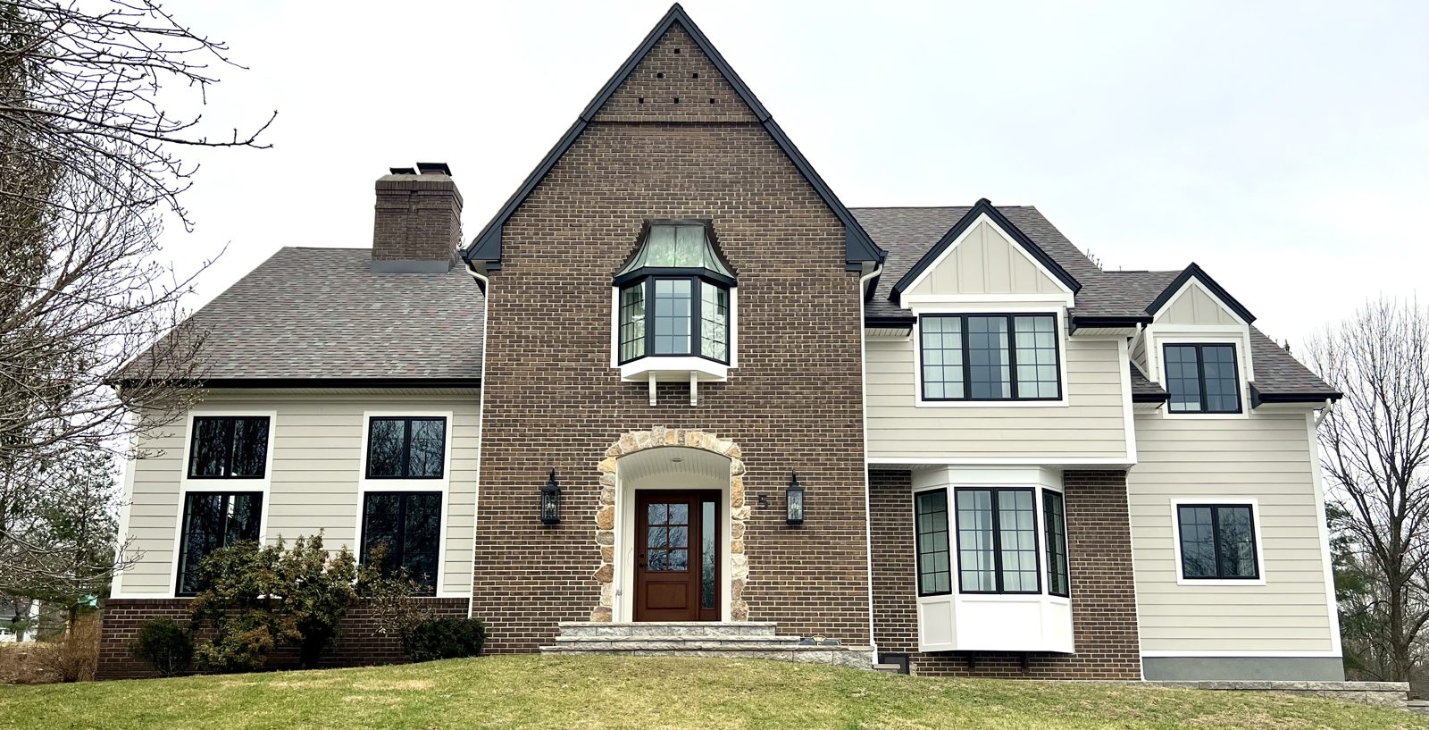 Magnolia Home Remodeling Group, Mendham NJ: house with James Hardie lap and board and batten siding and Andersen windows