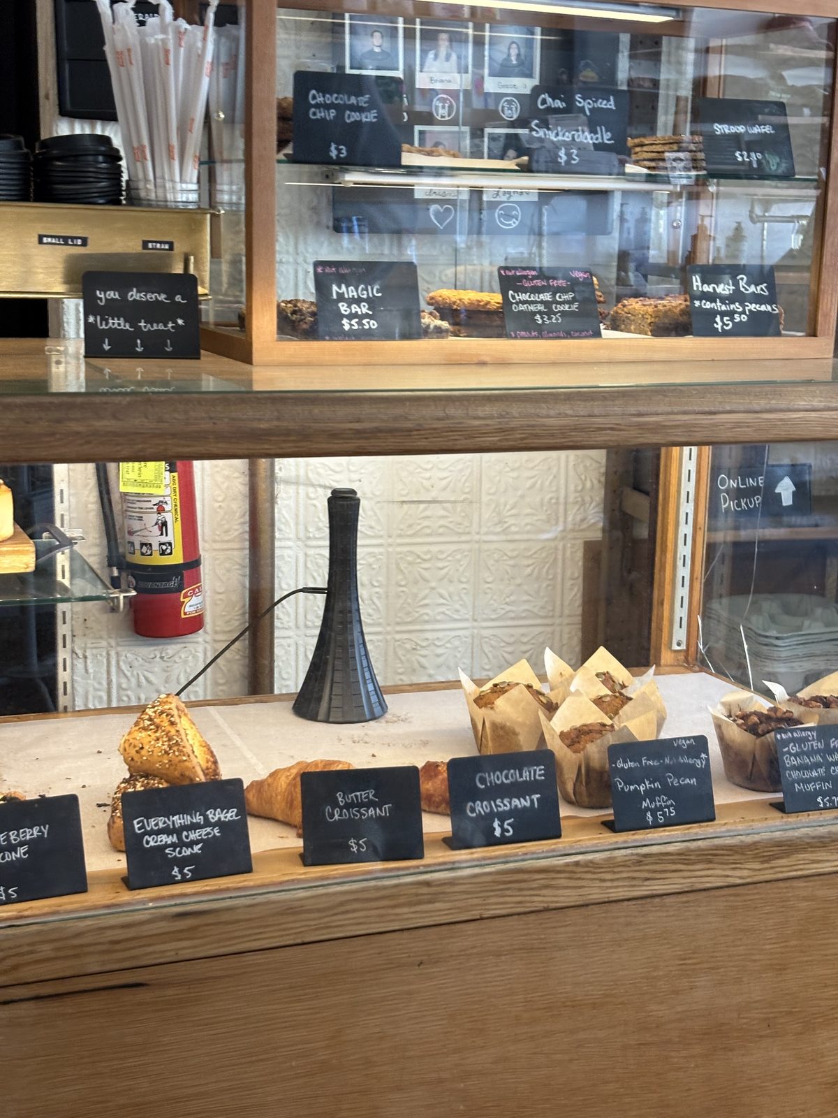 Scout's Coffee Bar + Mercantile, High Bridge - the pastry case with scones, croissants and muffins with hand-lettered price cards