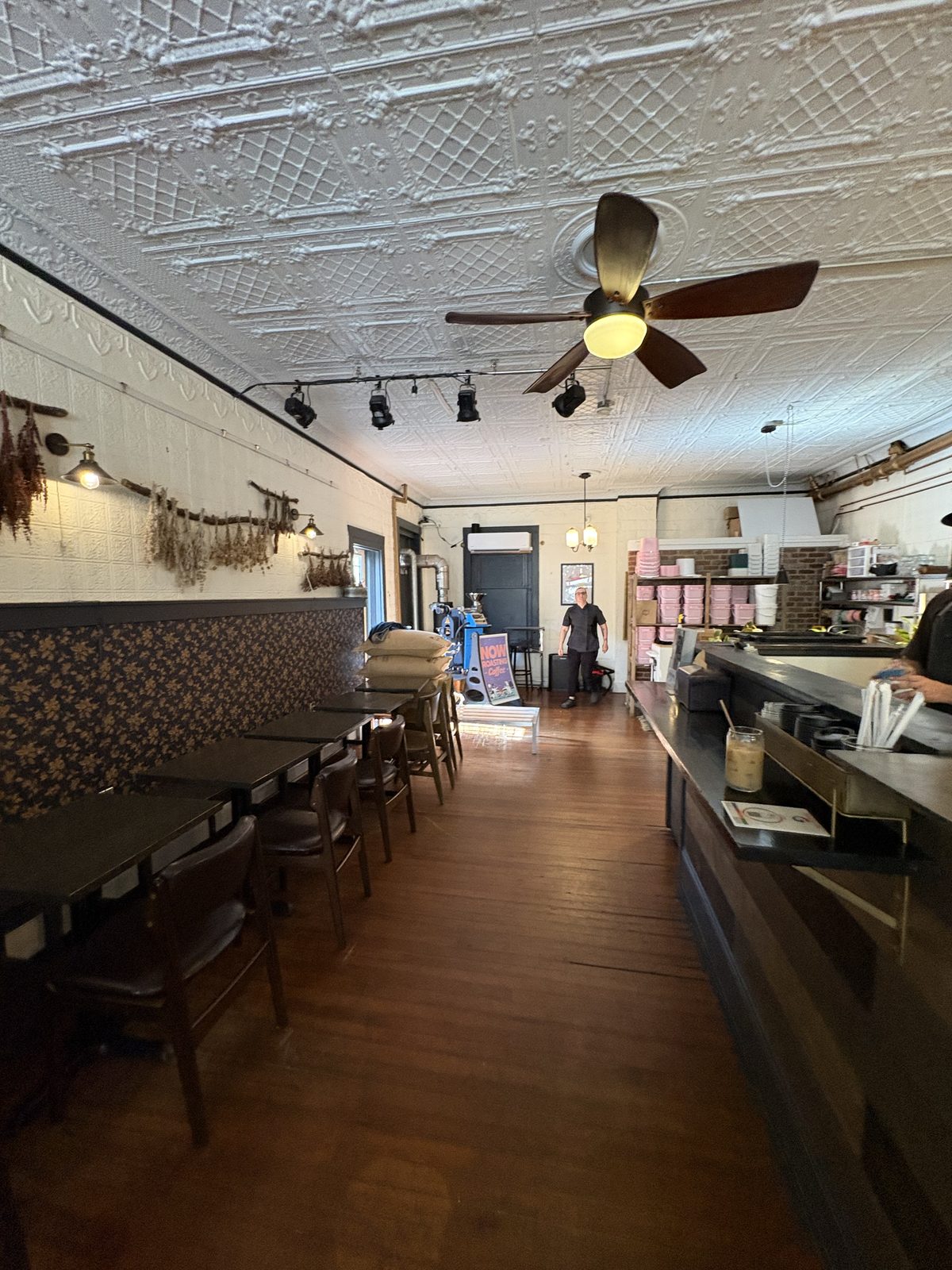 Scout's Coffee Bar + Mercantile, High Bridge - the long front room with the coffee bar on the right and tables along the left wall