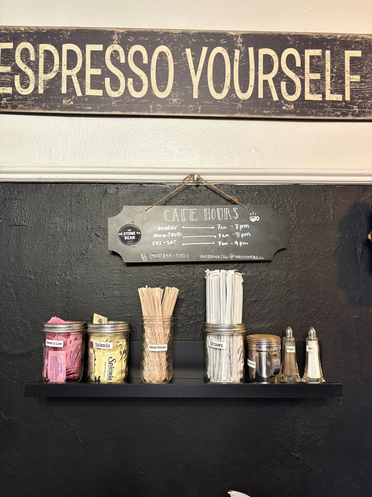 The Stone Bean, Clinton - the Cafe Hours chalkboard under an Espresso Yourself sign